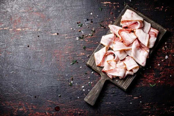 Pieces Fresh Bacon Cutting Board Spices Dark Background High Quality — Stock Photo, Image
