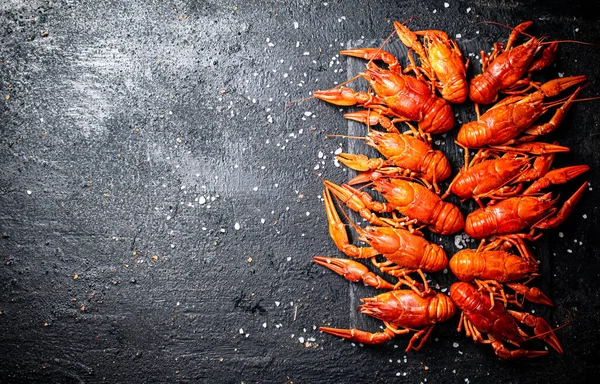 Boiled Crayfish Stone Board Salt Black Background High Quality Photo — 图库照片