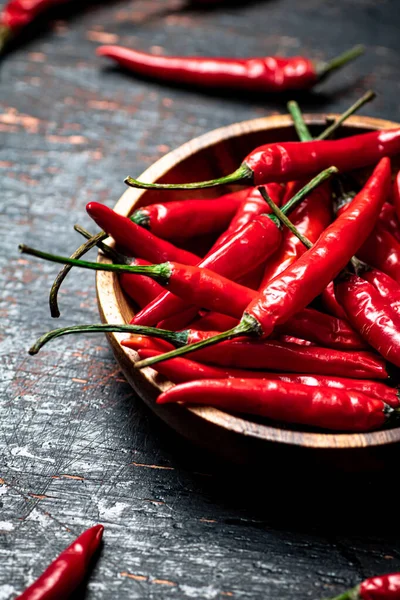 Wooden Plate Hot Chili Peppers Rustic Dark Background High Quality — стоковое фото