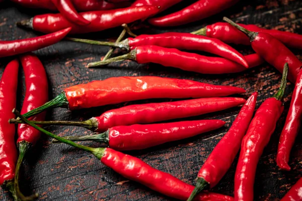 Bunch Hot Chili Pepper Pods Dark Background High Quality Photo — стоковое фото