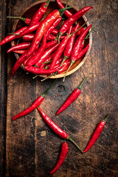 Pods Hot Chili Peppers Table Wooden Background High Quality Photo — стоковое фото
