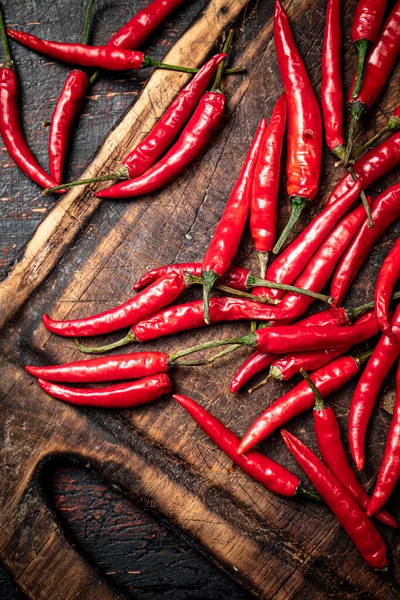 Pods Hot Chili Peppers Table Wooden Background High Quality Photo — стоковое фото