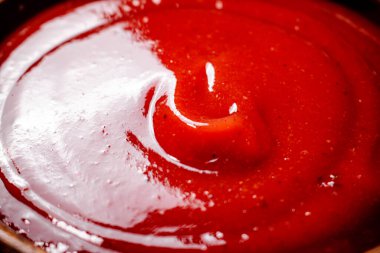 Ketçap. Makro arka plan. Domates sosunun dokusu. Yüksek kalite fotoğraf