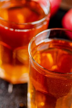 Fresh homemade apple juice. On a black background. High quality photo