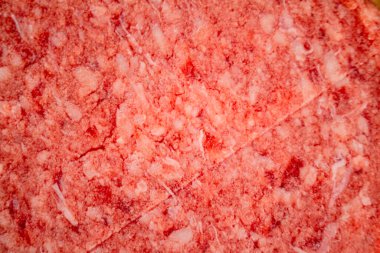 Raw burger. Macro background. The texture of the raw burger. High quality photo