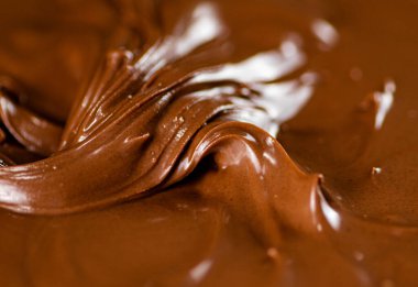 The texture of hazelnut butter. Macro background. High quality photo