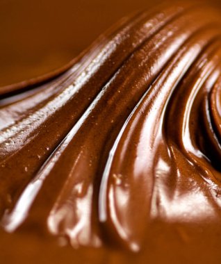 The texture of hazelnut butter. Macro background. High quality photo