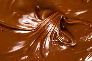 Fresh hazelnut butter. Macro background. The texture of hazelnut butter . High quality photo