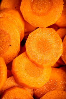 Sliced fresh carrots. Macro background. Carrot texture. High quality photo