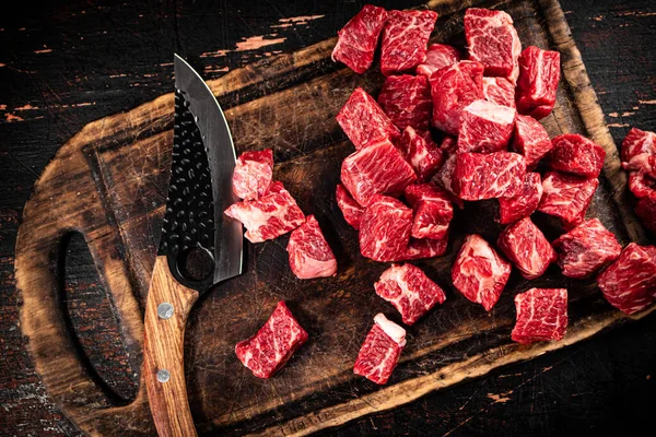 Raw Pieces Beef Cutting Board Knife Rustic Dark Background High — Zdjęcie stockowe