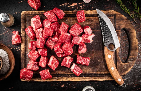 Raw Pieces Beef Cutting Board Knife Rustic Dark Background High — Zdjęcie stockowe