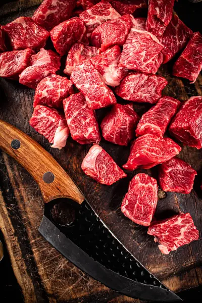 Cut Pieces Raw Beef Cutting Board Dark Background High Quality — ストック写真