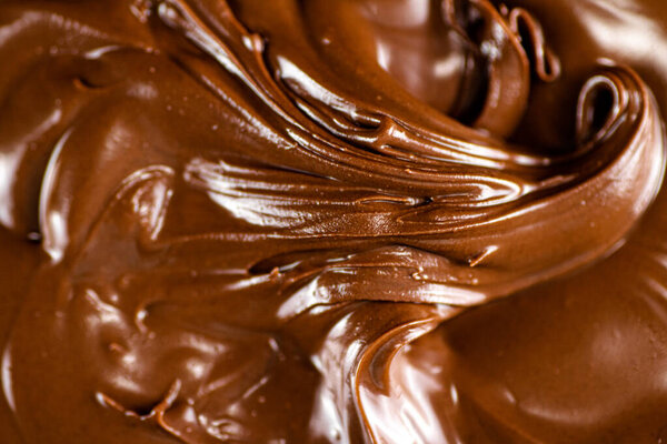 The texture of hazelnut butter. Macro background. High quality photo