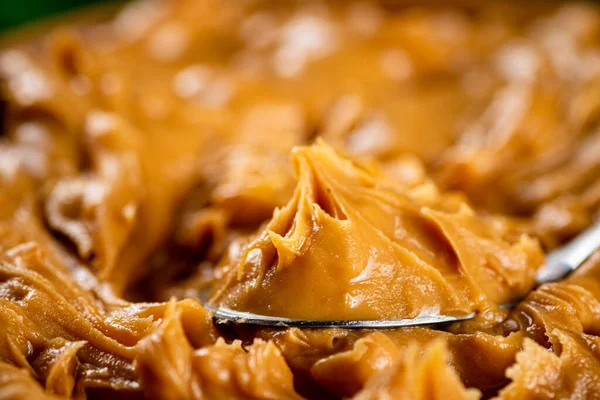 The texture of peanut butter. Macro background. High quality photo