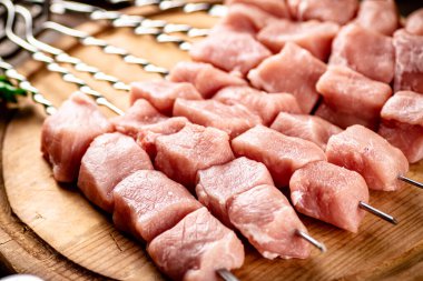 Pork raw kebab on a cutting board. High quality photo