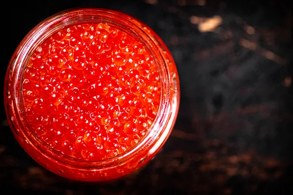 Red Caviar Glass Jar Dark Background Top View High Quality — Stockfoto