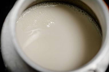 Village milk in a can. Macro background. High quality photo