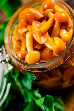 Fragrant marinated mushrooms. Macro background. High quality photo