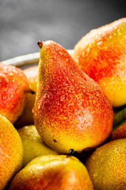 Pears fresh on a black background. High quality photo