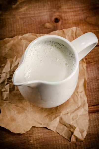Jug Fresh Milk Table Wooden Background High Quality Photo — Stockfoto