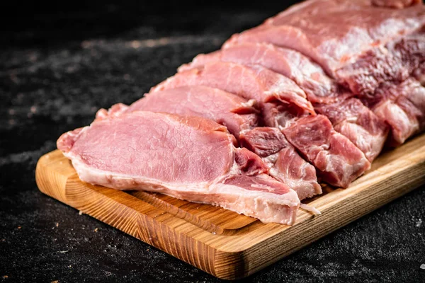 Raw Pork Sliced Wooden Cutting Board Black Background High Quality — Stock fotografie