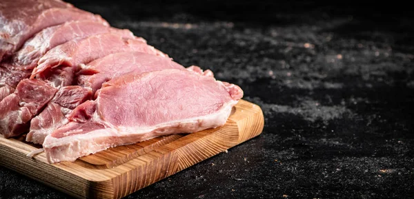 Raw Pork Sliced Wooden Cutting Board Black Background High Quality — Stockfoto