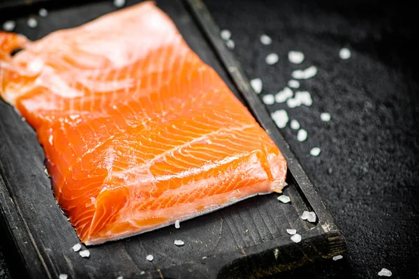 Delicious Salted Salmon Cutting Board Black Background High Quality Photo — ストック写真