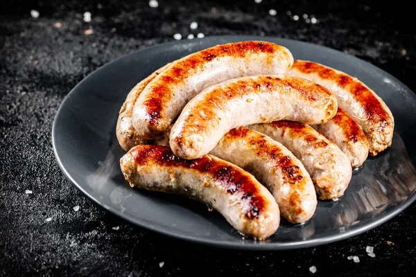 Ready Grilled Sausages Plate Black Background High Quality Photo — Photo