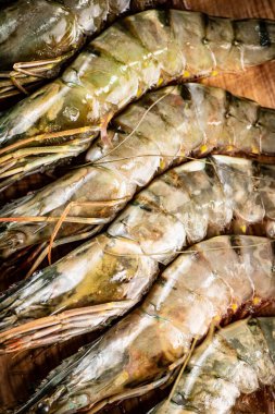 Fresh uncooked shrimp. Macro background. High quality photo