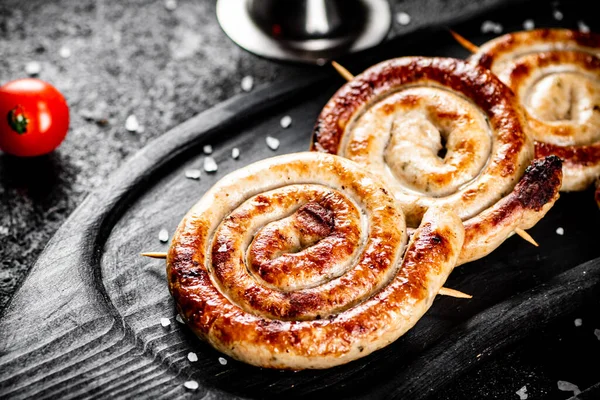 Aromatic Grilled Sausages Ruddy Crust Black Background High Quality Photo — Stock fotografie