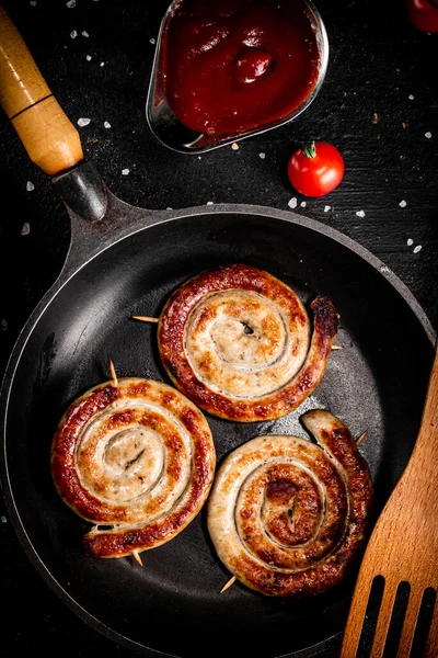Grilled Sausages Tomato Sauce Black Background High Quality Photo — Stock fotografie