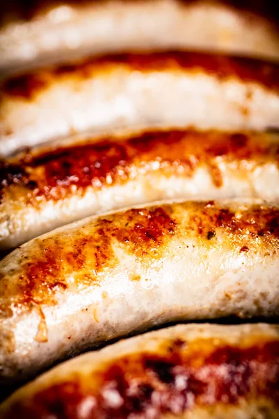 Grilled Sausages Ruddy Crust Macro Background High Quality Photo — Stock fotografie