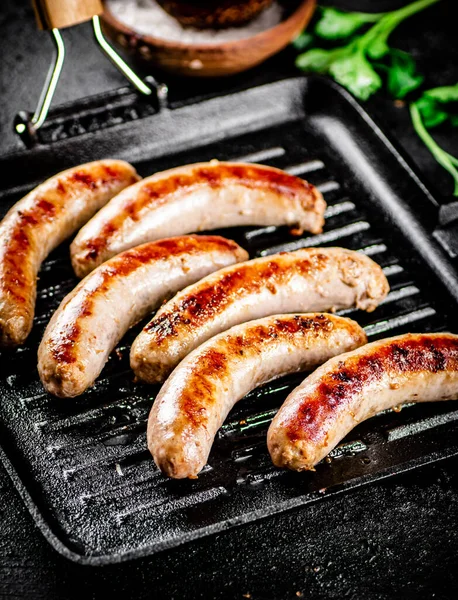 Grilled Sausages Frying Pan Parsley Black Background High Quality Photo — Photo