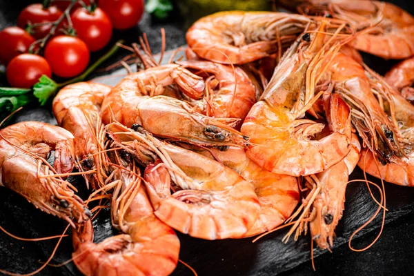 Boiled Shrimp Stone Board Tomatoes Parsley Black Background High Quality — 스톡 사진