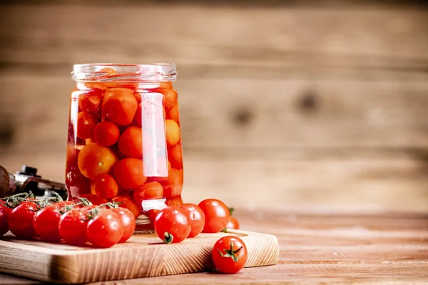 Pickled Ripe Tomatoes Glass Jar Wooden Background High Quality Photo — Stockfoto