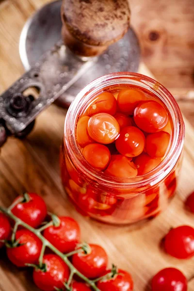 Pickled Ripe Tomatoes Glass Jar Wooden Background High Quality Photo — Fotografia de Stock