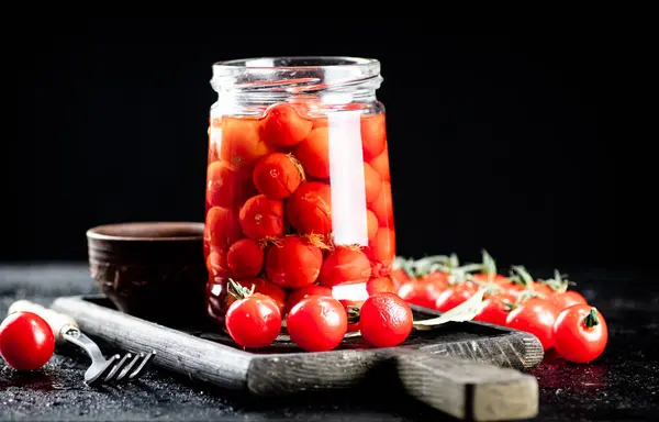 Pickled Tomatoes Glass Jar Cutting Board Black Background High Quality — Fotografia de Stock
