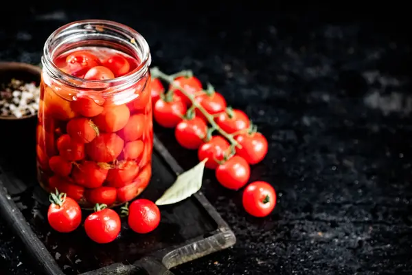 Pickled Tomatoes Glass Jar Cutting Board Black Background High Quality — 스톡 사진