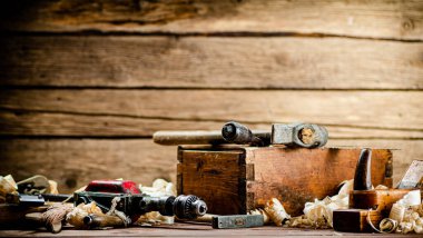 Various working tools on wood on the table. On a wooden background. High quality photo