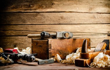 Various working tools on wood on the table. On a wooden background. High quality photo