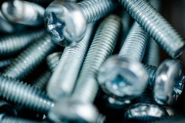 A pile of bolts. Macro background. High quality photo