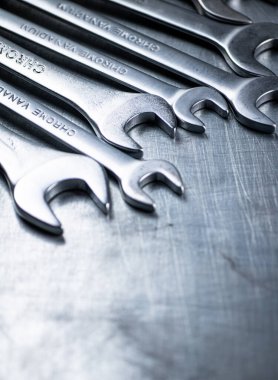 Wrench on a gray table. High quality photo