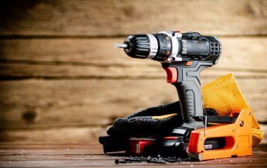 Working tool. Screwdriver. On a wooden background. High quality photo