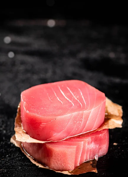 Raw Tuna Steaks Table Black Background High Quality Photo — Stok fotoğraf