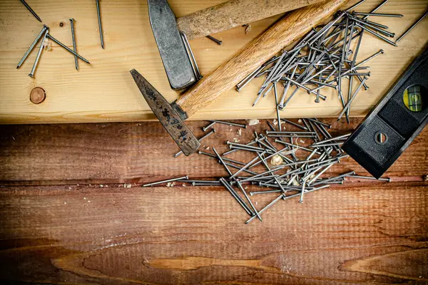 Hammer Bunch Nails Table Wooden Background High Quality Photo — Stockfoto