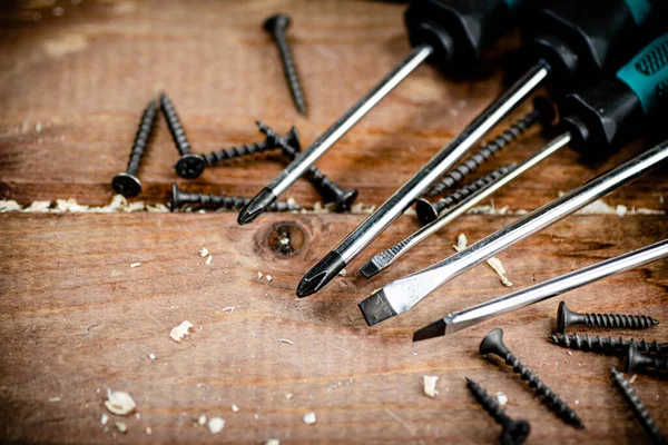 Screwdriver Bunch Self Tapping Screws Wooden Background High Quality Photo — Foto Stock