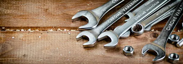 Wrenches Nuts Table Wooden Background High Quality Photo — ストック写真