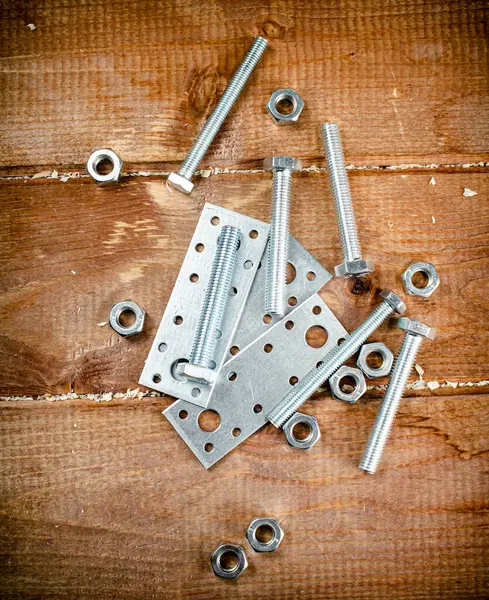 Metal Plates Fastening Wooden Background High Quality Photo — Stockfoto