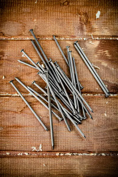 stock image Nails on the table. On a wooden background. High quality photo