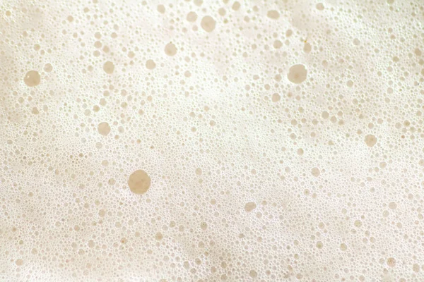 Stock image Beer foam. Shot from above .